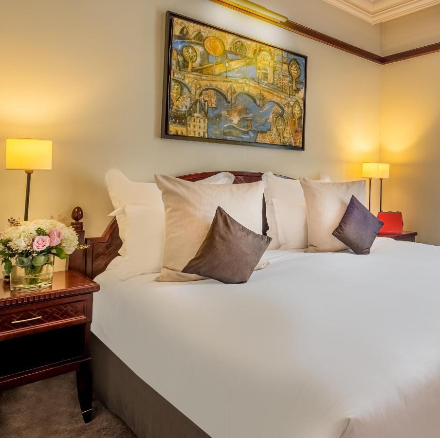 호텔 퐁 로얄 파리 외부 사진 A bedroom at the hotel