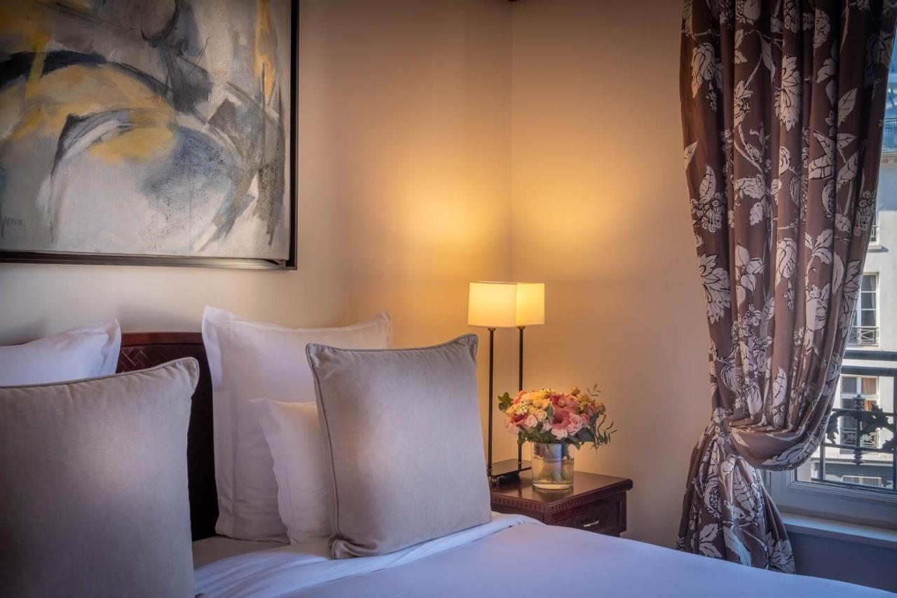 호텔 퐁 로얄 파리 외부 사진 A bedroom at the hotel